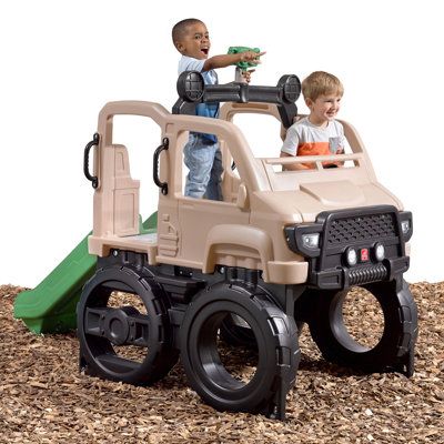 Transform your backyard into a wild adventure with the Step2 Safari Truck Climber! This stationary climber has a realistic off-road design, featuring oversized wheels; a neutral, safari color palette; an open rooftop design; and a rugged front grill with headlight decals. It even has a play binocular attachment to spot wildlife on the prowl! Little adventurers can climb through the oversized wheels and climb up the stairs to the top platform. From the upper level, kids can take turns at the stee Safari Truck, Kids Climber, Backyard Play Spaces, Kids Outdoor Playground, Rooftop Design, Playset Outdoor, Kids Slide, Play Gym, Pretend Play Toys