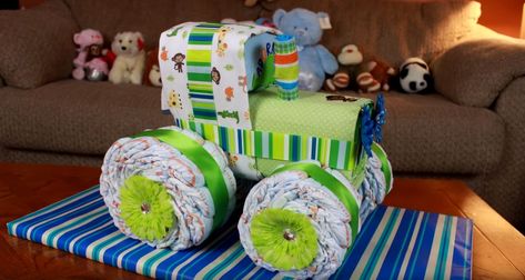 Looking for easy video instructions on how to make a tractor diaper cake? This diaper cake is perfect for little boys. All you need are diapers, receiving.. Diaper Tractor, Tractor Diaper Cake, Cake Tractor, Diaper Cakes Tutorial, Diaper Cake Instructions, Tractor Cake, Diaper Gifts, Farm Baby Shower, Creative Wrapping