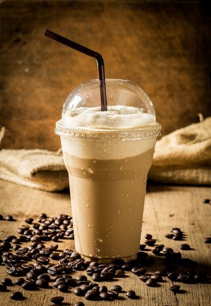 Photo iced coffee and roasted coffee on ... | Premium Photo #Freepik #photo #ice-latte #cold-coffee #ice-coffee #frappe Cold Coffee Photo, Iced Coffee Photography Aesthetic, Cold Coffee Images, Cold Coffee Photography, Frappe Aesthetic, Cold Coffee Aesthetic, Iced Coffee Photography, Coffee With Butter, Coffee Photography Aesthetic