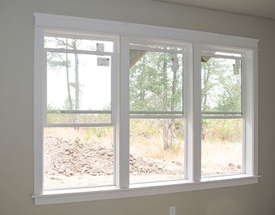 When Three Equals One: Trimming Three Windows with a Single Window Stool By Larry Walton Photos by Tim Walton When James and Michelle were designing their custom house on a great piece of property southwest of Eugene, Oregon, we talked about window designs, and how to incorporate active windows that can be … Wall With 3 Windows, Window Trim Ideas Interior Multiple Windows, Three Windows In A Row Exterior, 3 Windows In A Row Living Rooms, Trimmed Out Windows, Multiple Windows On One Wall, Triple Window Living Room, Three Windows In A Row Living Rooms, Windows Close Together