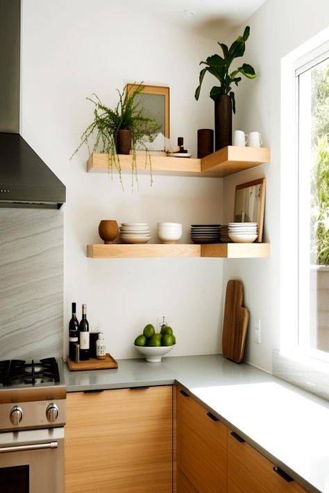 Floating wooden shelves with green plants and kitchen essentials in a contemporary kitchen setting. Counter Corner Decor, Kitchen Counter Corner Decor Ideas, Minimalist Kitchen Counter, Kitchen Counter Corner Decor, Kitchen Counter Corner, Corner Decor Ideas, Modern Kitchen Counter, How To Decorate Kitchen Counters, Minimalist Kitchen Counters