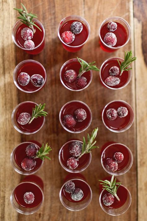 These beautiful burgundy shots, topped with pretty sugared cranberries, are ideal for a sophisticated Christmas party with a modern twist.  Get the recipe from A Beautiful Mess.   - Delish.com Cranberry Jello Shots, Holiday Jello Shots, Cranberry Jello, Jelly Shots, Jello Shot Recipes, Jello Shot, Shot Recipes, Jello Shots, Holiday Drinks