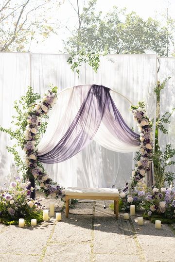 Purple And Lavender Wedding Decorations, Lilac Engagement Decor, Purple Pastel Wedding Theme, Beige And Lavender Wedding, Lavender And Gold Wedding Decorations, Purple Flower Arch Wedding, Round Wedding Arch With Flowers, Purple Decorations Wedding, Outside Wedding Arch