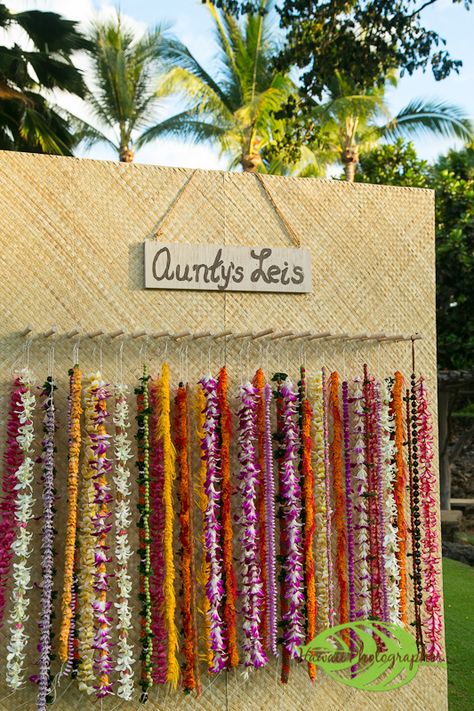 Guests were greeted with flower leis from a traditional Hawaiian lei stand and were assisted in selecting the perfect lei. Four Seasons Resort Hualalai Poly Wedding, Lei Stand, Hawaiian Wedding Themes, Wedding Rings Ideas, Pineapple Wedding, Sunset Party, Hawaiian Lei, Luau Wedding, Chocolate Bites