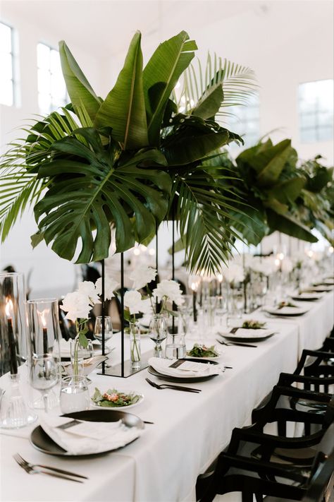 Wedding Flower Arrangements Tropical, Large Green Leaf Centerpiece, Tulum Style Wedding Decor, Black White Gold Boho Wedding, Tulum Table Setting, Bali Inspired Wedding, Botanical Wedding Theme Decor, Palm Leaf Centerpieces, Green Tropical Centerpiece