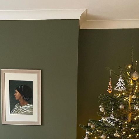 Farrow & Ball on Instagram: "A rich yet calming olive green, #Bancha really comes alive next to the beautiful tree in this dining space 🎄💚  📷 @peonyandprose #FarrowandBall" Wall Color For Small Spaces, Moss Green Hallway, Olive Green Hallway Ideas, Green Reading Room, Olive Hallway, Farrow And Ball Stairs, Farrow And Ball Bancha, Farrow And Ball Greens, Olive Green Walls Bedroom