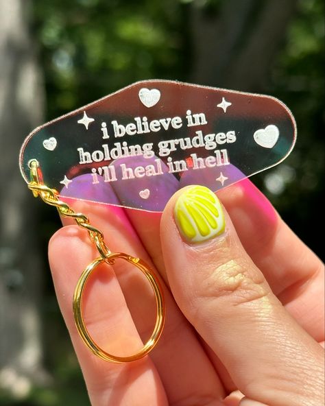 Fresh new photos of some of my keychains ✨ my keychains make fantastic gifts. They are all made and designed in house by ME. I use eye catching iridescent acrylic paired with a gold chain! My keychains are $12 and I sell them in my Etsy, Shopify and FAIRE. I have all sorts of dumb relatable phrases on them! Positive Quotes Keychain, Acrylic Keychain Ideas, House Keychain, Iridescent Acrylic, Keychain Acrylic, Acrylic Keychains, Photo Keychain, Nail Jewelry, Keychain Design