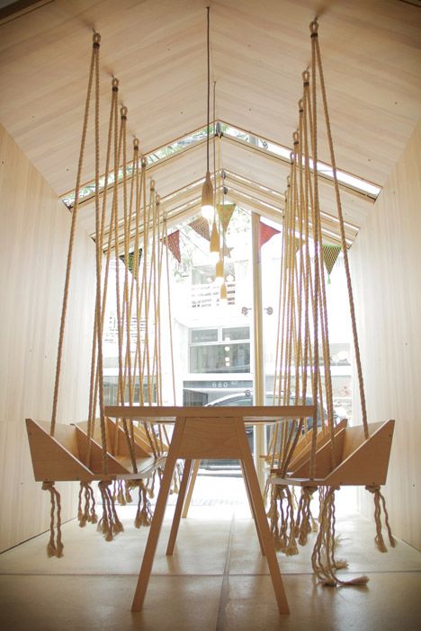 This cafe features wooden swing seats for both adults and children. Minimalist Living Room Design, Iconic Chairs, Fun House, Cafe House, Coffee Shop Design, Design Del Prodotto, Minimalist Kitchen, Minimalist Living, Minimalist Interior