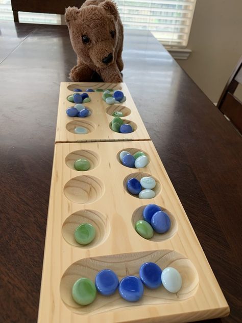 Mancala Game Aesthetic, Mancala Board, Mancala Game, Mathematics Games, Math Board, Diy Gifts For Girlfriend, Holiday Math, Game Aesthetic, Wooden Board Games