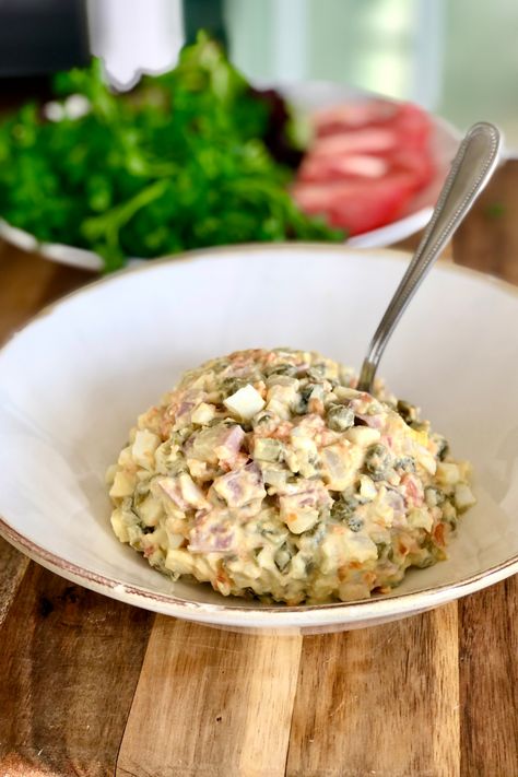 Classic Russian Potato Salad, a mixture of eggs, potatoes, peas, carrots and ham. A delicious and nutritiously rich side dish for any occasion. Salmon Puffs, Russian Potato Salad, Gluten Free Ham, Eggs Potatoes, Vinaigrette Salad, Potato Skin, Fermented Vegetables, Cubed Potatoes, Single Recipes