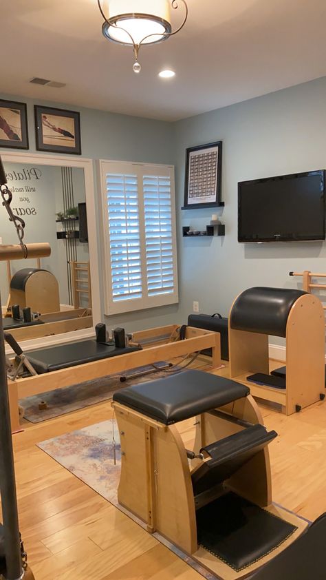 Classical Pilates home studio with reformer, Cadillac, ladder barrel, Wunda chair Pilates Workout Room At Home, Pilates Home Studio Gym Design, Basement Pilates Studio, Home Pilates Studio Ideas, Small Pilates Studio Design, Home Pilates Room Small Spaces, Home Reformer Studio, Garage Pilates Studio, Pilates Studio Decor