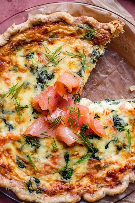 This creamy Smoked Salmon and Spinach Quiche is the ultimate breakfast or brunch for a salmon lover and is a perfect make ahead option to feed a crowd. Best served in a pie crust, you can also easily make this quiche crustless. Top with extra salmon, cr Quiche With Spinach, Quiche Crustless, Smoked Salmon Quiche, Salmon Pie, Apple Streusel Muffins, Salmon Quiche, All Butter Pie Crust, Salmon Spinach, Spinach Quiche