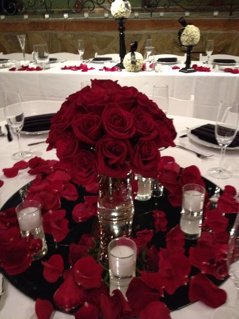 Glamorous red Rose centerpiece Red Rose Centerpiece Wedding, Red Rose Centerpiece, Red Roses Centerpieces, Rose Centerpieces Wedding, Thanksgiving Table Settings Simple, Christmas Budget, Rose Centerpiece, Red Rose Wedding, White Christmas Trees