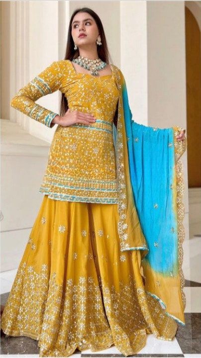 Punjabi Wedding Dress, Haldi Ceremony Outfit, Georgette Sharara, Haldi Dress, Cotton Tops Designs, Sharara Designs, Ethereal Elegance, Floral Frocks, Girls Attire