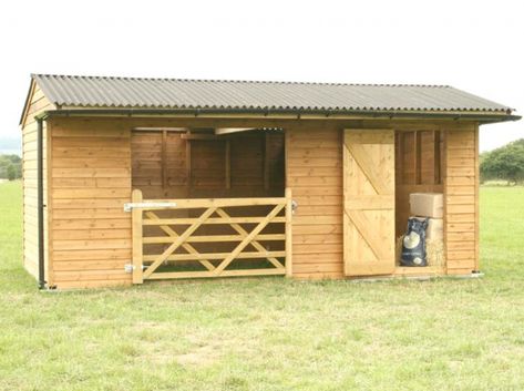 Here is our 6m x 3.1m Mobile Field Shelter. This particular shelter has been fitted with a wooden gate and a Tack/Feed Room, which for added security and protection also includes an internal timber floor. Horse Shelter With Hay Storage, Horse Field, Field Shelters, Small Horse Barns, Feed Room, Horse Shed, Horse Farm Ideas, Diy Horse Barn, Horse Barn Ideas Stables