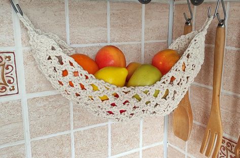 Kitchen fruit hammock. Crochet drawing pdf . Storage of bread, bananas, apples in a hanging basket. You will need a cotton cord with a diameter of 3 mm and hooks No. 5 and No. 6 (optional). The instruction contains 11 videos, 13 photos of the process and a text description of each row. Crocheting this fruit hammock is very simple. Fruit Hammock Pattern, Hammock Pattern, Crafts For Cats, Fruit Baskets Diy, Crochet Drawing, Hanging Baskets Kitchen, Crochet Hammock, Crochet Projects Ideas, Fruit Hammock