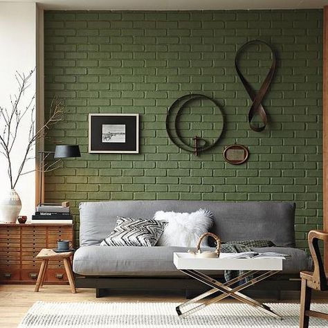 sage green brick wall and a grey sofa Painted Brick Wall, Painted Brick Walls, Brick Interior Wall, Grey Couch, Brick Interior, Living Room Decor Gray, Wall Accent, Trendy Living Rooms, Brick Walls