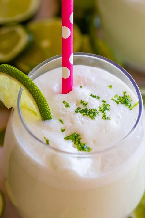 This Brazilian Limeade recipe is a refreshing non-alcoholic drink! Whole limes are blended w/ sweetened condensed milk. Frothy, tart & sweet! Brazilian Limeade, Brazilian Drink, Brazilian Lemonade, Limeade Recipe, The Food Charlatan, Flan Recipe, Milk It, Food Charlatan, Ice Water