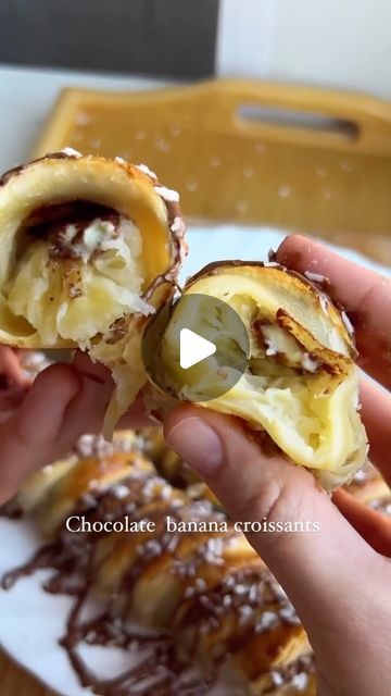 Currant App on Instagram: "Chocolate Banana Boats Wrapped in Puff Pastry Croissant with @theblendofsuccess   Ingredients: - Puff pastry: 400 grams - Bananas (ripe): 3 pieces - Chocolate: 100 grams (Kinder or your preferred type) - An egg (for egg wash) - Chocolate for decoration  Directions:  1. Preheat the oven:  Preheat your oven to 200°C (400°F).  2. Prepare the puff pastry:  - Roll out the puff pastry on a lightly floured surface to about 1/8 inch thickness.  - Cut the puff pastry into long strips, about 1/2 inch wide.  3. Prepare the bananas:  - Peel the bananas.  - Cut out a small trough in the center of each banana using a spoon, being careful not to break the banana.  4. Add the chocolate:  - Place pieces of chocolate in the trough of each banana half. Ensure the chocolate is sprea Puff Pastry Banana, Banana Puff Pastry, Puff Pastry Croissant, Banana Wrap, Bachelorette Food, Pastry Croissant, Crescent Breakfast, Banana Boats, Chocolate Puff