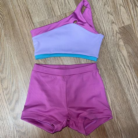 Loving this one shoulder Honeycut Cali Set!!🩵🩷💜 https://tightspotdancewear.com/products/cali-top-cali-shortie-separates #activewear #dancer #dancewear #movehappy #dancelove #ballet #ballerina #dancestore #danceshop #dancerproblems #dance #dancewear #explorepage #danceislife #dancereels #activewearfashion #dancersofinstgram #exploreplageready #fierceandfree #dancechallenge Dance Store, Dancer Problems, Dance Uniforms, Outfits 2016, Crop Top And Shorts, Activewear Fashion, Dance Life, Dance Teams, Dance Studio