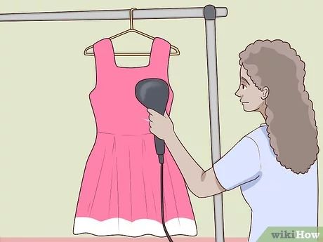 3 Easy Ways to Steam Dresses - wikiHow Closet Renovation, Handheld Steamer, Clothes Steamer, Garment Steamer, Shower Rod, A Hook, Creative Crafts, The Heat, Wrinkles