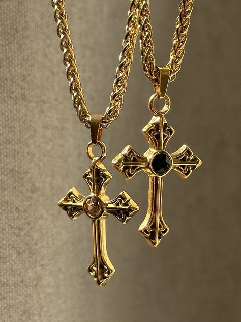 The Saint Necklace 🤍 Featuring a unique gold cross of your choice and an 18k gold plated stainless steel woven chain. Shower proof!  I tried to show both colors in various settings with different lighting- they both feature a cz crystal (choose between champagne and black)  Unisex & tarnish proof- choose desired length at checkout 🖤 each will come with an extender for adjustability.  Made with love 🫶 Black And Gold Cross Necklace, Gold Plated Stainless Steel Jewelry, Gold Black Jewelry, Unique Cross Necklace, Big Cross Necklace, Black And Gold Jewelry, Saint Necklace, Dope Jewelry Accessories, Big Cross