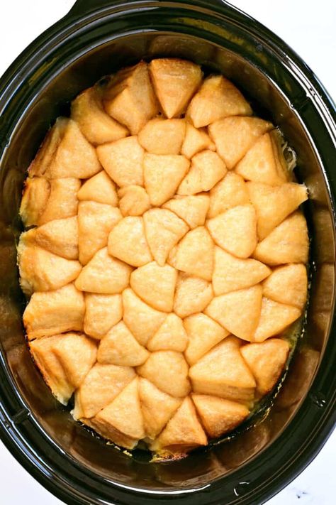 Crock Pot Chicken and Dumplings are easy to make with tender chicken pieces and vegetables in a creamy sauce with flaky dumplings on top. Crock Pot Chicken And Dumplings With Biscuits, Chicken And Dumplings In The Crockpot, Chicken Dumpling Crockpot Recipes, Crockpot Biscuit Chicken And Dumplings, Crockpot Chicken Dumplings Biscuits, Crock Pot Chicken And Biscuit Recipes, Chicken Dumplings Crockpot Biscuits Easy, Crock Pot Chicken N Dumplings, Instant Pot Chicken And Dumplings Grands