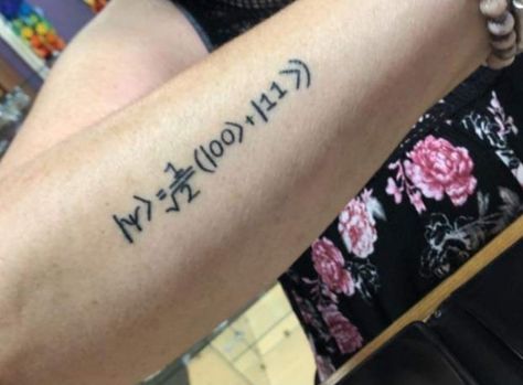 Quantum equations for entanglement tattoo Quantum Entanglement Tattoo, Quantum Equations, Quantum Mechanics Tattoo, Quantum Physics Tattoo, Physics Tattoo Ideas, Quantum Tattoo, Physics Tattoos, Couples Tattoos, Mark Anthony