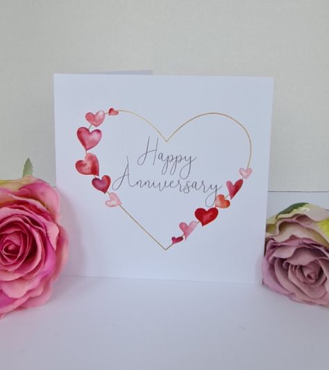 A beautiful card to wish a couple a happy anniversary Gold geometric heart with added watercolour hearts Front text reads 'Happy Anniversary' All cards are blank inside so that you can add your own thoughts and best wishes. White Blank envelope included CARD BUNDLES ARE NOW AVAILABLE - CHOOSE 5 CARDS FROM BLOSSOM TREE DESIGNS UK ETSY SHOP FOR £10 PLEASE SEE SEPERATE LISTING BELOW FOR MORE INFORMATION https://www.etsy.com/uk/listing/884496164 How will my order be delivered - Made from 300gsm hamm Heart Card, Geometric Heart, Gold Geometric, Best Wishes, Happy Anniversary, Envelope