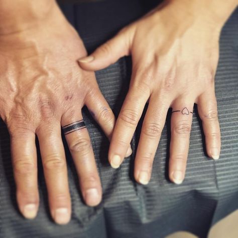 Mountainview Tattoo - Karin Swain Tattoos on Instagram: "20 years of loving each other and still going strong ❤️ 💍 #neverloseyourringagain #weddingbandtattoo #weddingringtattoo #putaringonit #chilliwacktattoo #fraservalleytattoo #mountainviewtattoo #tattoosbykarswain" Wedding Ring Tattoo For Men, Celtic Band Tattoo, Wedding Ring Finger Tattoos, Black Band Tattoo, Anniversary Tattoo, Band Tattoos For Men, Ring Tattoo Designs, Wedding Band Tattoo, Tattoo Guide