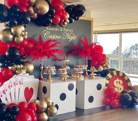 Iris Hinzo on Instagram: "Casino Night. You need it, we got it! Event Design, Dessert Table, Photo Backdrop, and Centerpieces by @bizziebeecreations || Balloons @styllupballoons || Casino Props @platinumprophouse || Decal and signage @meritsigncompany || Desserts @dipd_n_dripd || Venue @losverdesgcevents #casinonightparty #casinoparty #casinopartytheme #anniversaryparty #anniversary #desserttable #photobackground #centerpieces #casinocenterpieces #eventdesign #event #eventstyling #eventstylist # Casino Theme Centerpiece, Casino Theme Party Backdrops, Las Vegas Themed Centerpieces, Masquerade Casino Night, Casino Dessert Table Ideas, Casino Photo Backdrop, Casino Royale Centerpieces, Poker Night Table Decor, Casino Backdrop Ideas