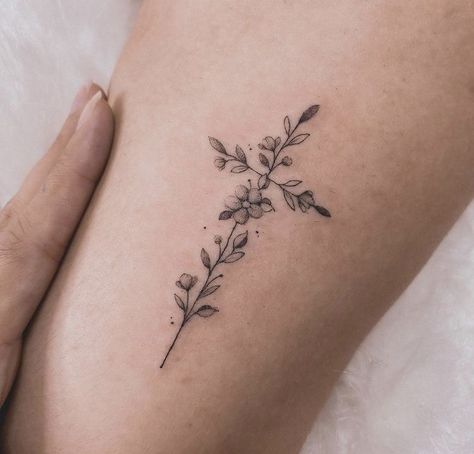 Wrist Tattoos With Words, Cross Made Out Of Flowers Tattoo, Everything Happens For A Reason Tattoo Flowers, Dainty Cross With Flowers Tattoo, Danty Tattoos Women Wrist, Cross Made Of Roses Tattoo, Cross Of Flowers, Cross On Ribs Tattoo For Women, Cross Daisy Tattoo