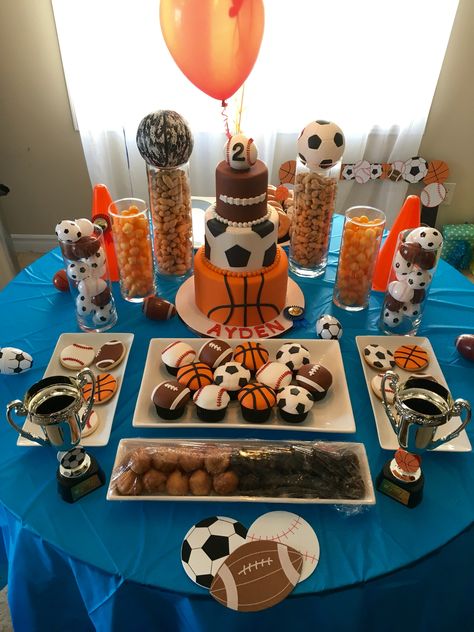 Sports Birthday Theme - Dessert Table for Ayden's 2nd Birthday - basketball baseball soccer football - sports cupcake - sports cookies - champion - balls - sweet table Sport Cupcakes, Sports Baby Shower Theme, Baby Shower Games Coed, Sports Baby Shower, Basketball Birthday Parties, Sports Theme Birthday, Ball Birthday Parties, Boy Baby Shower Ideas, Sports Birthday Party