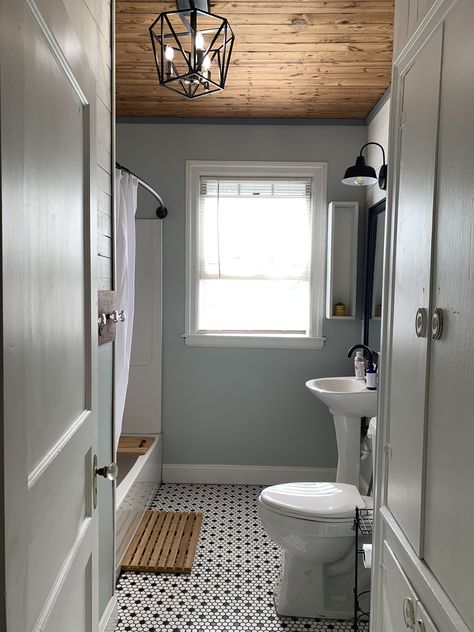 Hexagon tile, wood plank ceilings, small farmhouse bathroom! Bathroom Ideas Wood Ceiling, Small Hexagonal Tiles Bathroom, Wood Shiplap Ceiling Bathroom, Shiplap On Bathroom Ceiling, Bathroom Pine Ceiling, Half Bath Ceiling Ideas, Wood On Ceiling Bathroom, Bathroom With Cedar Ceiling, Planked Bathroom Ceiling