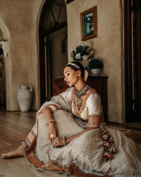 Brideopedia | Today, I’m feeling all retro, thus taking out this gem portrait from my saved feed for the inspiration. A cream lehenga, gajra, aalta and… | Instagram Indian Style Photoshoot, Indian Attire Photoshoot, Indian High Fashion Photography, Palace Photoshoot Indian, Indian Bridal Editorial Photoshoot, Lehenga Editorial, Indian Wedding Editorial, Bold Saree Photoshoot Indoor, Indoor Editorial Photoshoot