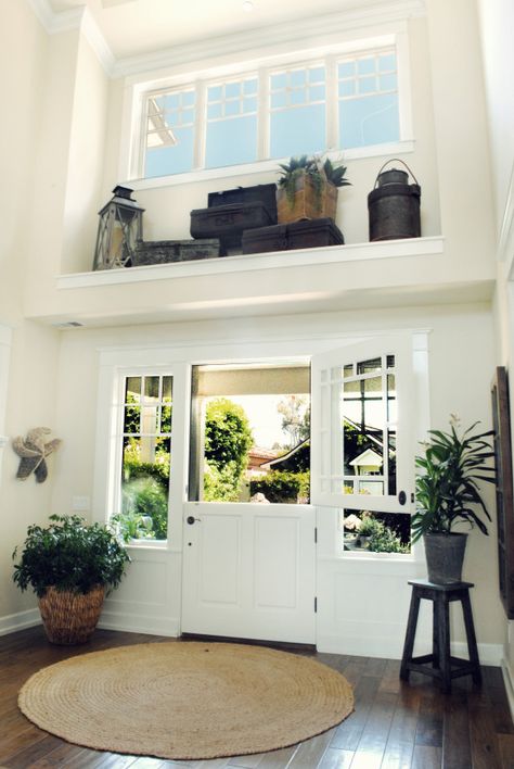 Hmmm - storage about the door?  Maybe a little paint color too... VL Decor For High Ledges, High Ledge Decorating Ideas, Plant Ledge Decorating, Window Ledge Decor, Wide Front Doors, Ledge Decor, Plant Wall Decor, Window Ledge, Foyer Decor