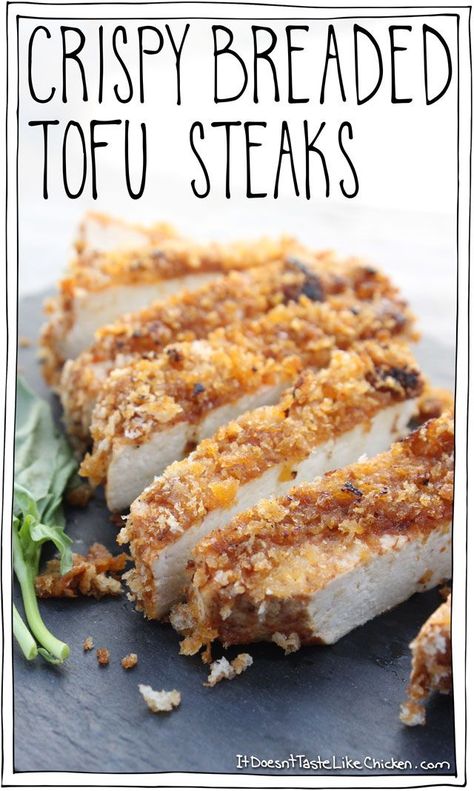 Crispy Breaded Tofu Steaks! Moist and tender tofu, zingy tomato marinade, with a crispy breadcrumb coating. A quick and easy recipe that is perfect for serving with potatoes and veg. Gluten free option. #itdoesnttastelikechicken Tomato Marinade, Tofu Steaks, Breaded Tofu, Tofu Steak, Like Chicken, Crispy Tofu, Tofu Recipes, Idee Pasto Sano, Vegan Foods