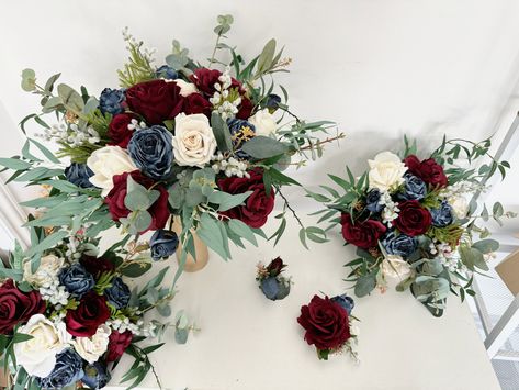 Matching arch flower: https://www.etsy.com/FloralDate/listing/1085763363/burgundy-ivory-white-navy-blue-wedding?utm_source=Copy&utm_medium=ListingManager&utm_campaign=Share&utm_term=so.lmsm&share_time=1632279952983 Size about 38cm / 15" in diameter for the bridal bouquet (pictured one) about 25cm / 10" in diameter for the bridesmaid bouquet (as the picture shows) Material silk flowers, faux foliage, etc.  Flowers & Foliages rose, eucalyptus, etc. Colors burgundy, navy blue, ivory white, etc. * P Bridesmaid Bouquet Burgundy Navy Blue, Maroon And Navy Blue Wedding, Burgundy Navy Blue Wedding, Burgundy And Navy Blue Wedding, Red And Blue Wedding, Blue And Burgundy Wedding, Bookish Wedding, Red White And Blue Wedding, Red Rose Bridal Bouquet