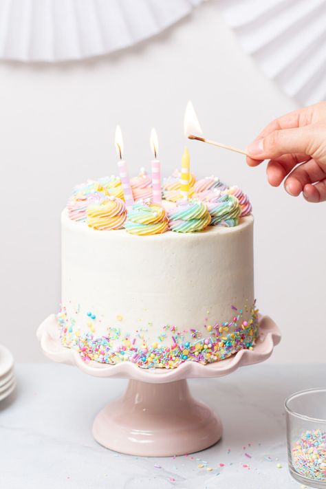 Rainbow sprinkle cake with buttercream frosting and candles.  Now you can make your own homemade Funfetti cake from scratch! #rainbowcake #sprinklecake #funfetticake #birthdaycake Leap Year Birthday Cake, Rainbow Sprinkle Cake, Homemade Funfetti Cake, Birthday Cake Rainbow, Rainbow Sprinkle Cakes, Rainbow Cake Recipe, Cake With Buttercream Frosting, Cake Rainbow, Rainbow Sprinkle