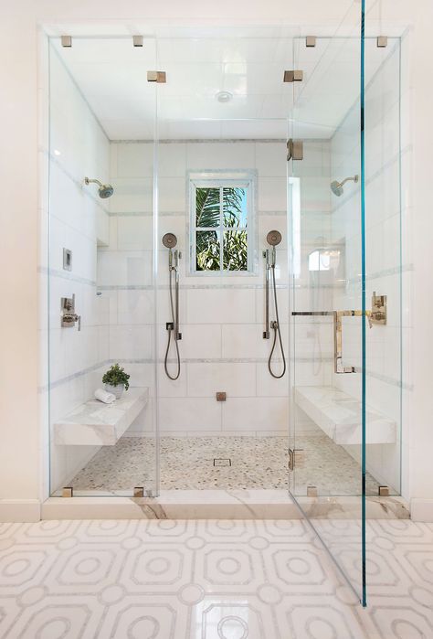 An all white shower with glass doors with multiple shower heads. Our bathrooms at home see a lot of action, and when it is a shared bathroom, the activity doubles. From master baths to Jack and Jill baths, consideration needs to be taken on how the room will function for those using it, regardless if one person is using the space, or if the room is truly shared at the same time... Read more on the Dura Supreme Blog! Large Shower With Two Shower Heads, Double Shower Head Bathroom, Shower For Two Walk In, Two Headed Shower Ideas, Shower With Two Heads Master Bath, Couple Showers Bathroom, Two Person Shower Walk In, 2 Person Shower Master Bath, Master Bath Layouts