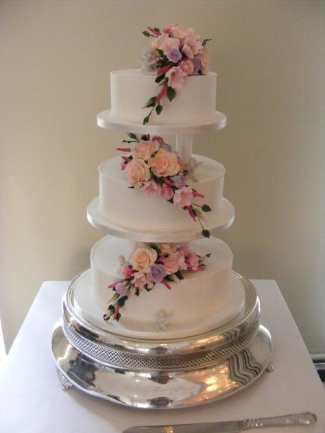 Grace, classic royal iced and pillared wedding cake with wired sprays of pastel sugar flowers Pink Wedding Cakes, Blush Pink Wedding Cake, Wedding Cakes Elegant, Quinceanera Cakes, Wedding Cake Alternatives, Traditional Wedding Cakes, Traditional Wedding Cake, Classic Wedding Cake, Lace Wedding Cake