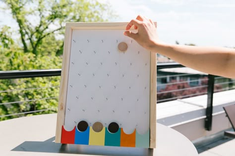 How to Make a DIY Plinko Game Board - Home Improvement Projects to inspire and be inspired | Dunn DIY | Seattle How To Build A Plinko Board, Diy Plinking Board, How To Make Plinko Board, Home Made Game Board, Plinko Board Diy How To Make, Diy Plinko Game, Cricut Games Diy, Plinko Diy, Plinko Board Diy