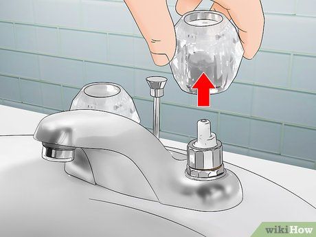 How to Fix a Bathroom Faucet: 14 Steps (with Pictures) - wikiHow Fix Leaky Faucet, Bathroom Countertop Storage, Airstream Renovation, Leaky Faucet, Faucet Repair, Bathroom Sink Drain, 12 Steps, Bathroom Pictures, Faucet Handles