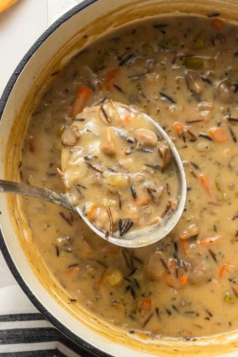 This is the best vegan creamy Mushroom Wild Rice Soup with veggies, coconut milk, garlic and plenty of herby flavors. Make a warm and easy bowl of soup for dinner tonight!For me, the fall and winter mean full-on soup season. From Spicy Ginger Sweet Potato Soup to Slow Cooker Vegetarian... Wild Rice Soup Recipes, Rice Soup Recipes, Instant Pot Soup Recipes, Wild Rice Soup, Instant Pot Soup, Rice Soup, Idee Pasto Sano, Wild Rice, Mushroom Soup