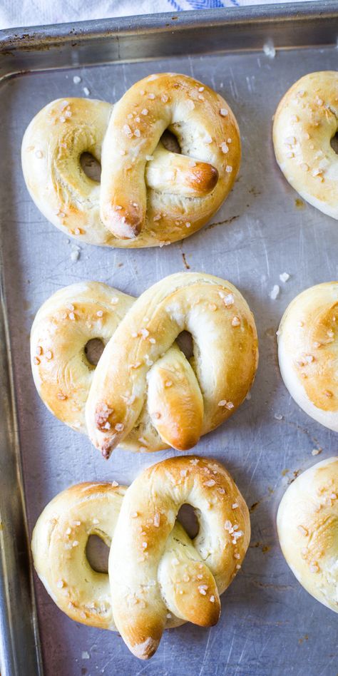 three homemade soft pretzels on baking pan Pretzels Homemade, Cleverly Simple, Pretzel Recipe, Soft Pretzel Recipe, Stuffed Bread, Homemade Pretzels, Homemade Soft Pretzels, Simple Pantry, Pantry Ingredients