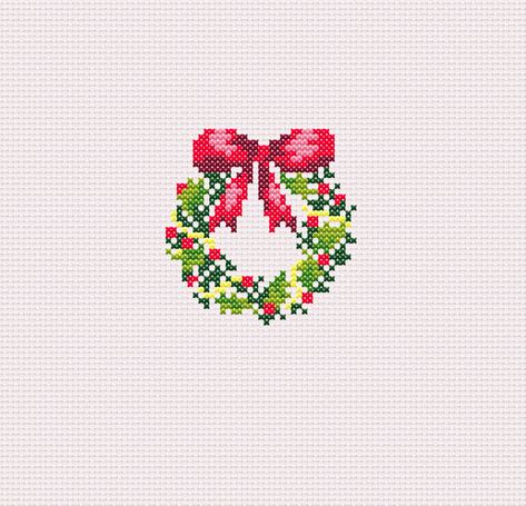 Small Christmas Wreath Cross Stitch PDF Pattern Perfect for anyone who loves Christmas or the holidays! Contains color names and DMC numbers Approximately 633 stitches to create Christmas Wreath Cross Stitch, Small Christmas Wreath, Christmas Cross Stitch Patterns Free, Wreath Cross Stitch, Holiday Cross Stitch Patterns, Cross Stitch Numbers, Wreath Cross, Cross Stitch Christmas Stockings, Tiny Cross Stitch