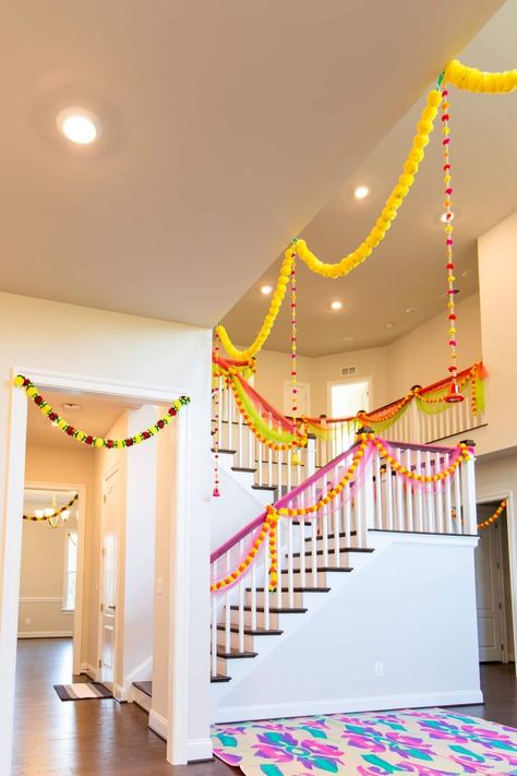 House Decoration For Onam, Grihpravesh Decoration, House Warming Ideas Indian, Home Inogration Decorations Indian, Diwali Decorated House, Home Decor For House Warming Indian, Mhendi Home Decoration Simple, Staircase Flower Decoration Indian, Griha Pravesh Decoration Ideas