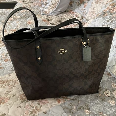 Nwt Team Coach ,Signature City Tote F58292, Black & Brown This Bag Is An Excellent Condition Very Clean Inside And Out No Rips, Tears Or Stains Signature Coated Canvas Inside Zip Zip Top Closure, Fabric Lining 11 3/4”(L) X10 1/2 (H) X 5 1/2 (W) Please See Pictures, If You Have Any Questions, Please Ask