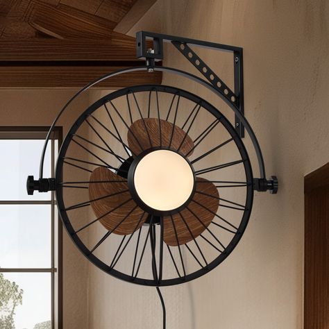 This Black FANSCONCE wall-mounted fan light wood black cage ceiling fan with light combines industrial style with practical functions with its unique round metal frame and simple blade design, making it an ideal choice for both beauty and comfort. The LED light source equipped in the center provides three color temperature adjustments, which can easily adapt to different scene atmospheres. The fan supports a 720-degree swing to achieve all-around airflow coverage. At the same time, the six-speed Wall Mounted Fan, Black Cage, Wall Fan, Low Profile, Decor Lighting, Fan Light, Ceiling Fan With Light, Flush Mount, Ceiling Fan