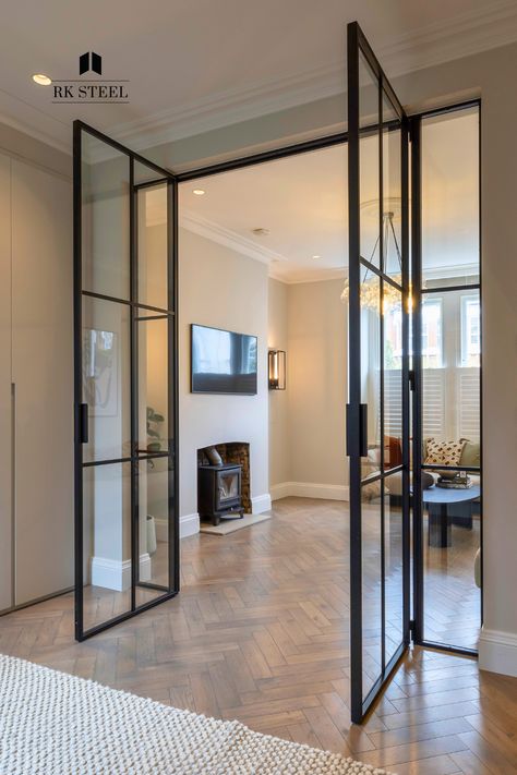 Glass Doors Between Rooms, Internal Steel Glass Doors, Black Glass Door Living Room, Crittal Doors Living Room, Sliding Doors Living Room, Glass Wall Between Kitchen And Living, Kitchen And Living Room Partition, Lounge Doors, Internal Room Divider Doors